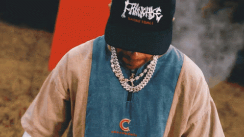 A Man Wearing A Hat That Says Franchise GIF