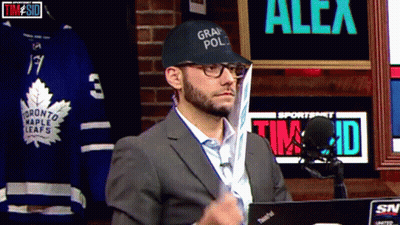 A Man Wearing A Hat That Says Grand Pol GIF