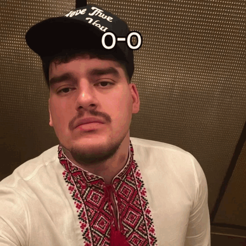 A Man Wearing A Hat That Says I Love Five Hat GIF