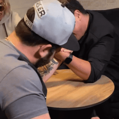 A Man Wearing A Hat That Says " Keeper " On It GIF
