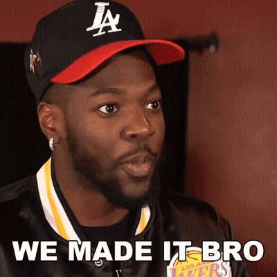 A Man Wearing A Hat That Says La On It GIF
