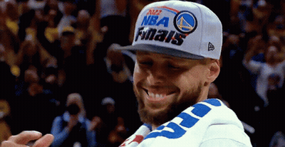 A Man Wearing A Hat That Says Nba Finals Is Smiling GIF