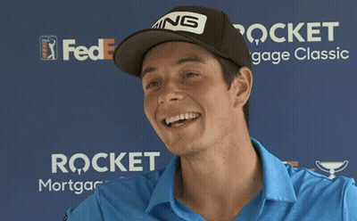 A Man Wearing A Hat That Says Ping Is Laughing GIF