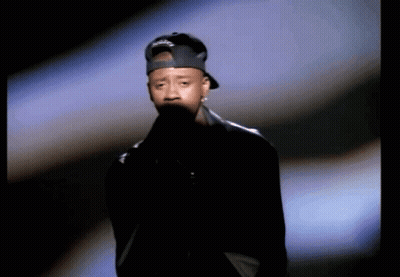 A Man Wearing A Hat That Says ' Reebok ' On It GIF