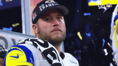 A Man Wearing A Hat That Says ' Sb Champ ' On It GIF