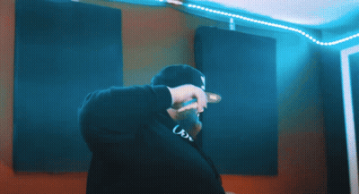 A Man Wearing A Hat That Says Us On It GIF