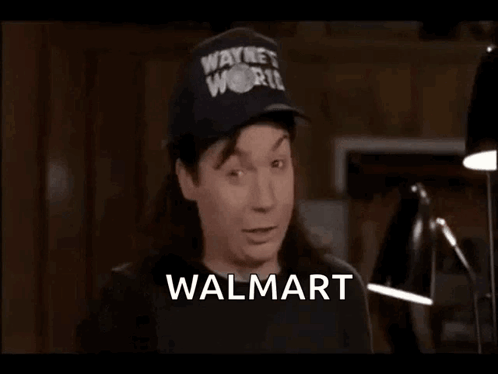 A Man Wearing A Hat That Says Wayne 'S World Is Saying Walmart It Certainly Does Suck GIF