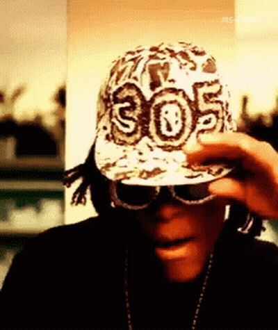 A Man Wearing A Hat With 305 On It GIF