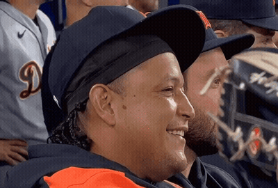 A Man Wearing A Hat With A Letter D On It GIF