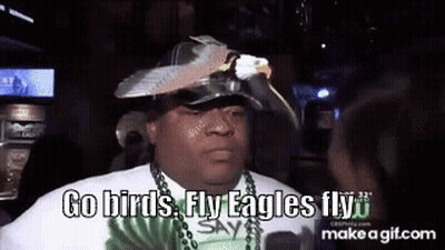 A Man Wearing A Hat With An Eagle On It And A Shirt That Says Go Birds Fly Eagles Fly GIF