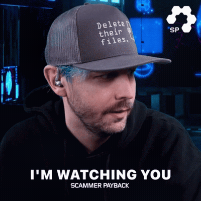 A Man Wearing A Hat With Delete Their Files On It GIF