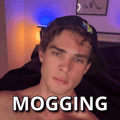 A Man Wearing A Hat With The Word Mogging Written On It GIF