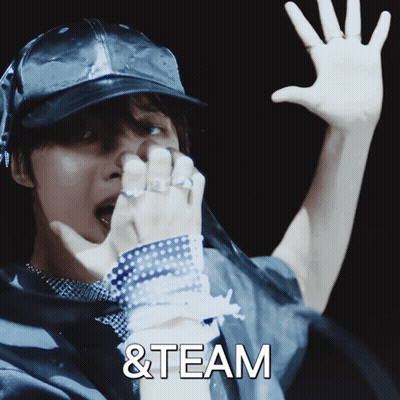 A Man Wearing A Hat With The Words & Team On The Bottom Right GIF