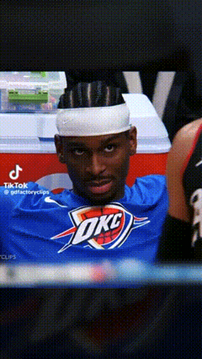 A Man Wearing A Headband And A Okc Shirt GIF