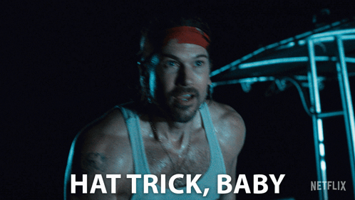 A Man Wearing A Headband And A Tank Top Says Hat Trick Baby GIF