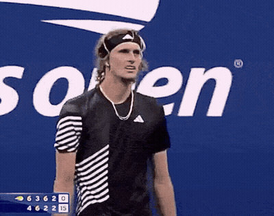 A Man Wearing A Headband Stands In Front Of A Sign That Says ' Us Open ' GIF