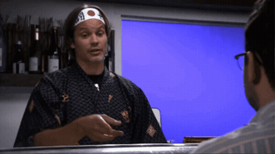 A Man Wearing A Headband That Says ' A ' On It GIF