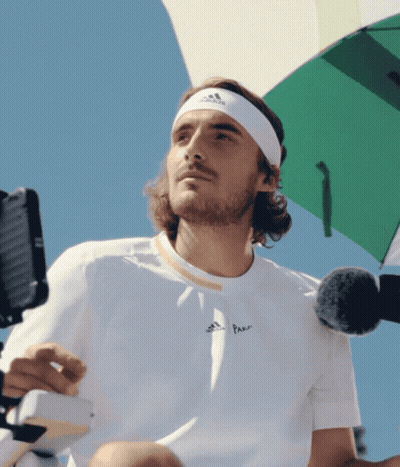A Man Wearing A Headband That Says Adidas GIF