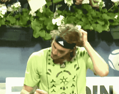 A Man Wearing A Headband With Adidas On It GIF