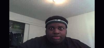 A Man Wearing A Headband With Eagles On It GIF