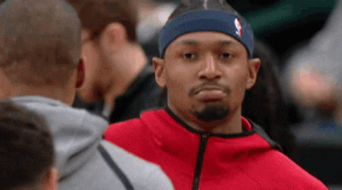 A Man Wearing A Headband With The Nba Logo GIF