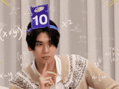 A Man Wearing A Headband With The Number 10 On Top GIF