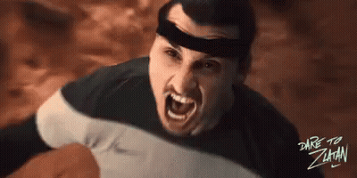 A Man Wearing A Headband With The Words Dare To Zihan Written On The Bottom GIF