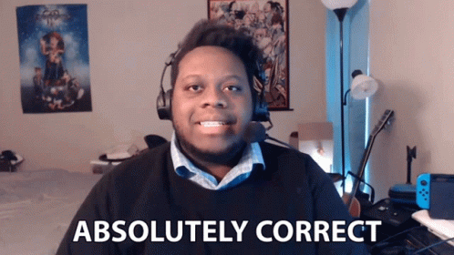 A Man Wearing A Headset Says " Absolutely Correct " In Front Of Him GIF
