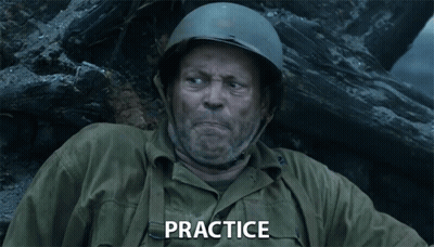 A Man Wearing A Helmet And A Green Jacket Has The Word Practice On His Chest GIF