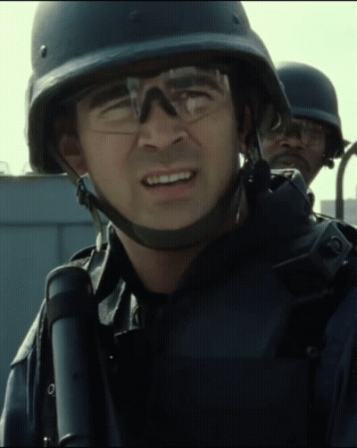 A Man Wearing A Helmet And Glasses Holds A Binoculars GIF