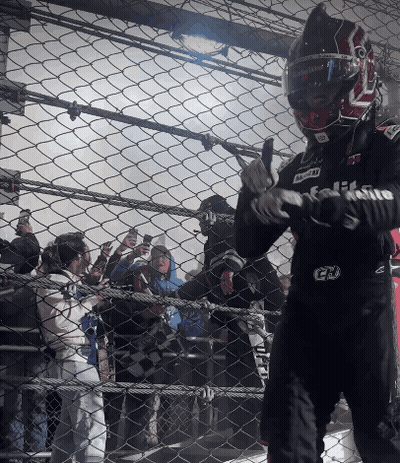 A Man Wearing A Helmet And Gloves With The Letters Gd On The Front GIF