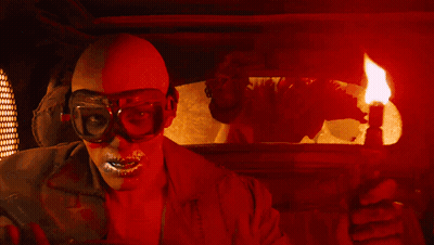 A Man Wearing A Helmet And Goggles Says " I Live I Die " GIF