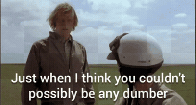 A Man Wearing A Helmet Is Talking To Another Man In A Field With The Words Just When GIF
