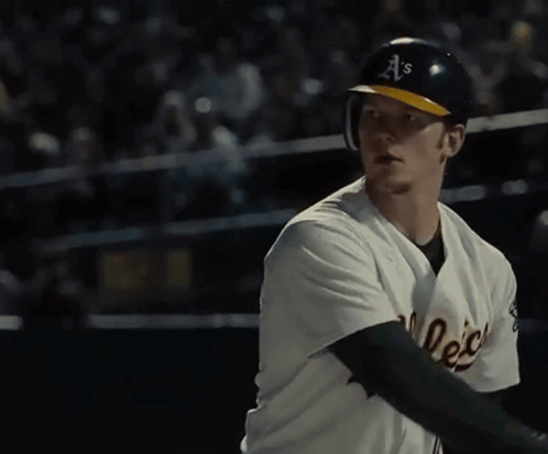 A Man Wearing A Helmet With The Letter A On It GIF
