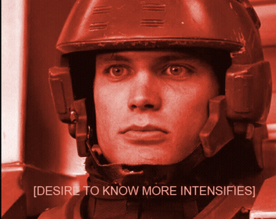 A Man Wearing A Helmet With The Words Desire To Know More Intensifies On The Bottom GIF