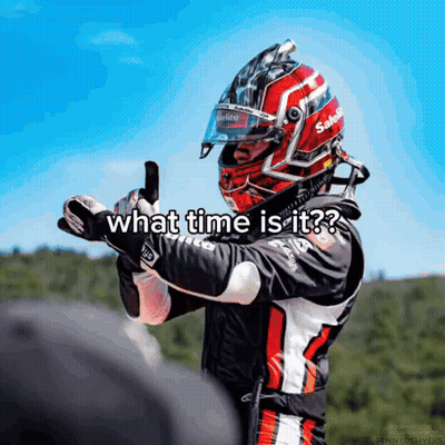 A Man Wearing A Helmet With The Words What Time Is It Written On It GIF