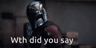 A Man Wearing A Helmet With The Words " Wth Did You Say " Written Below Him GIF