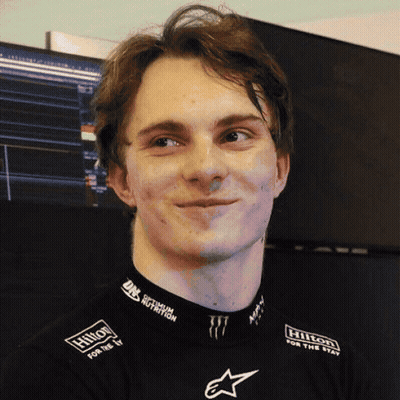 A Man Wearing A Hilton For The Stay Shirt GIF
