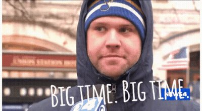 A Man Wearing A Hooded Jacket And A Hat Says Big Time Big Time GIF