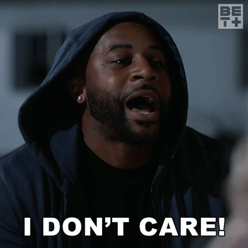 A Man Wearing A Hooded Jacket Says I Don 'T Care GIF