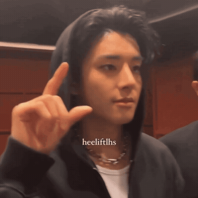 A Man Wearing A Hoodie And A Necklace Has The Hashtag Heelliftlhs On The Bottom Right GIF