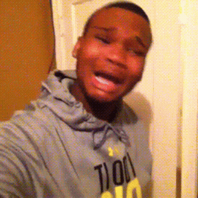 A Man Wearing A Hoodie That Says 100 On It Is Taking A Selfie GIF