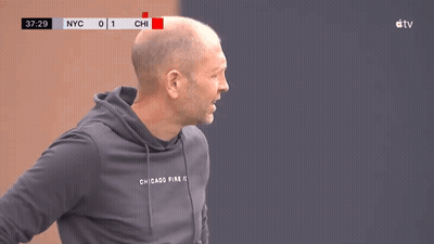A Man Wearing A Hoodie That Says Chicago Fire On The Front GIF