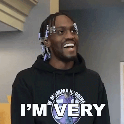 A Man Wearing A Hoodie That Says I 'M Very Is Smiling GIF