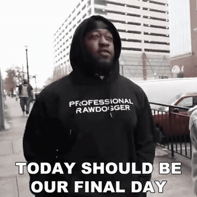 A Man Wearing A Hoodie That Says Professional Rawdogger GIF