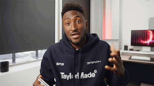 A Man Wearing A Hoodie That Says Taylormade On It GIF