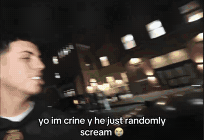 A Man Wearing A Hoodie With The Letter C On It GIF