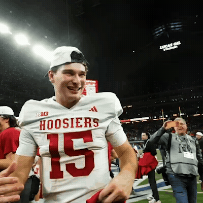 A Man Wearing A Hoosier Jersey With The Number 15 GIF