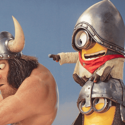 A Man Wearing A Horned Helmet Stands Next To A Yellow Minion GIF
