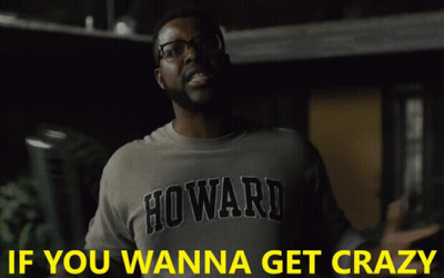 A Man Wearing A Howland Shirt Is Holding A Piece Of Paper GIF
